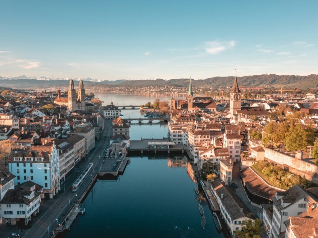 Zurich old town with the Limmat river, the lake and the Alps
